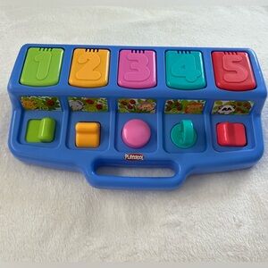 Colorful Pop-Up Toy by Playschool. In great condition. All pop-ups work.